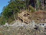 Staircase leading to water.