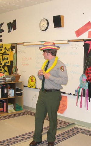 Ranger wearing funny hat and Hawaiian necklace