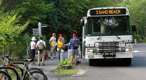 An Island Explorer bus picks up passengers at Sieur de Monts Spring.