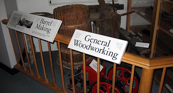 The barrel making and woodworking exhibits include signage, tools, and a barrel.