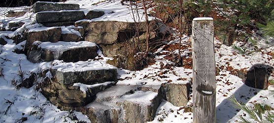 Trail sign and icy steps