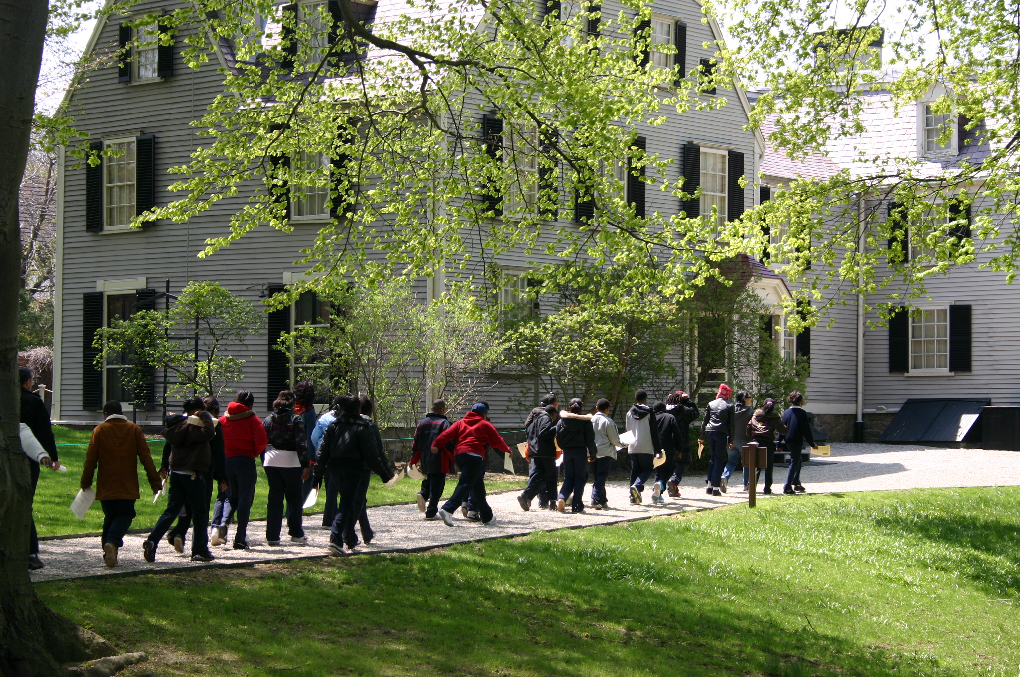 Visitors touring the Old HOuse at Peace field