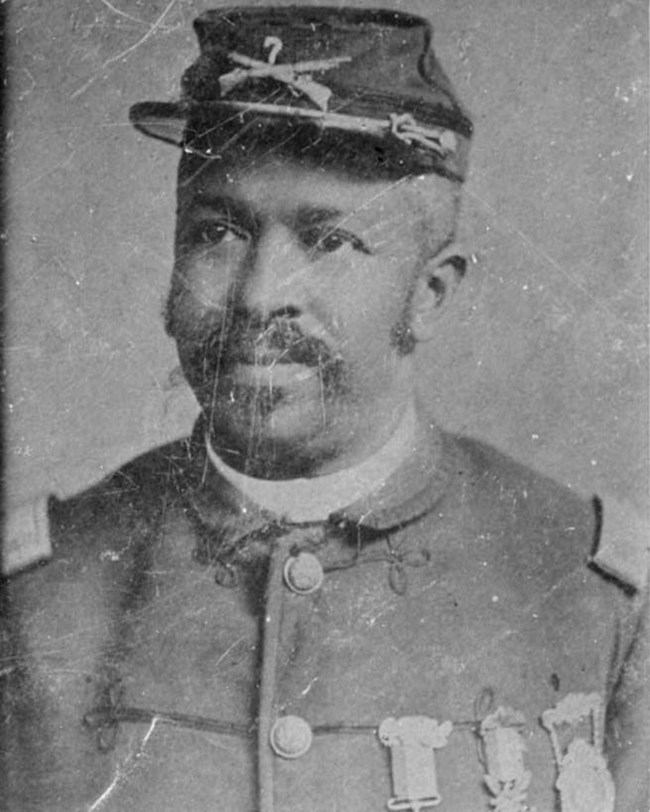 Black and white photo of Christian Fleetwood in uniform wearing medals