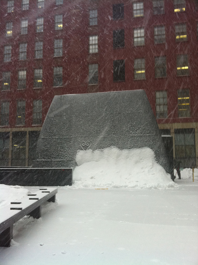 Snow Falling on Outdoor Memorial