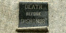 Carved stone panel bearing the words motto "Death before Dishonor" Carved stone panel bearing the words motto "Death before Dishonor"