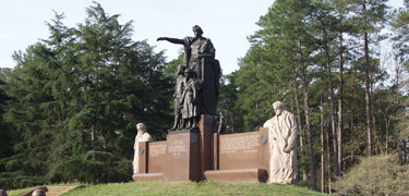 Bronze and stone monument structure of the Illinois Monument in the National Cemetery