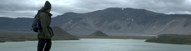 Hiker Overlooking Surprise Lake
