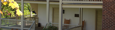 homestead-porch-in-fall
