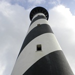 The Cape Hatteras Lighthouse rising into the sky.