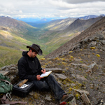 Geologist conducting research in Upper Riley drainage