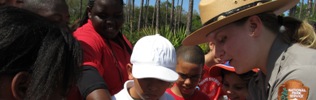 Students and ranger on a field trip