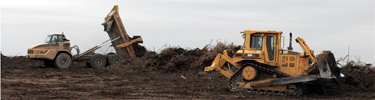 Earth Movers Working in the Hole-in-the-Donut