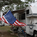 Motorhome with American Flag flying in front