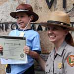 A proud, new Junior Ranger is sworn in.