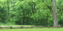 A picture of the landscape and split rail fence at the Boyhood Home Unit at Knob Creek A picture of the landscape and split rail fence at the Boyhood Home Unit at Knob Creek