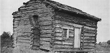 A historic picture of the symbolic birth cabin of Abraham Lincoln