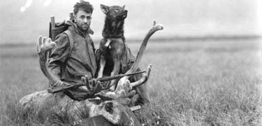 Glacier Priest Father Bernard Hubbard and dog at Aniakchak