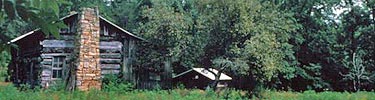 Old log cabin standing at the Oscar Blevins Farm