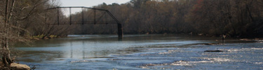 Shoals at Jones Bridge with bridge ruins in the background - Photo by Matt Harr