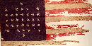 A portion of the 33-star United States flag, also known as the Fort Sumter garrison flag A portion of the 33-star United States flag, also known as the Fort Sumter garrison flag