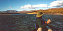 Person paddling down the Noatak River. Person paddling down the Noatak River.