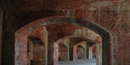The arches at Fort Massachusetts are made of red and tan bricks. The arches at Fort Massachusetts are made of red and tan bricks.