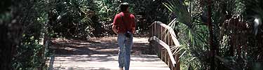 Man hiking on trail at Fort Caroline.