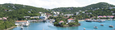 Cruz Bay Harbor with NPS Visitor Center on far left on water's edge