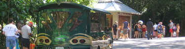 Safari taxi unloading visitors at Trunk Bay