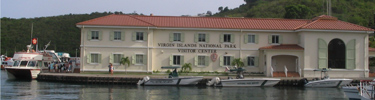 The Visitor Center is a two-story building with administrative offices on the second floor and the rear two-thirds of the first floor.