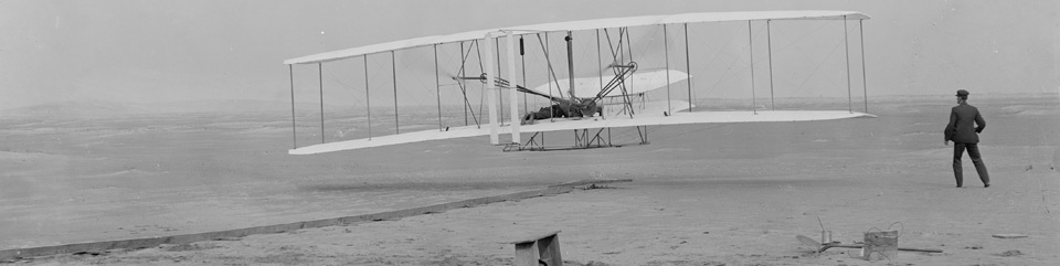 The iconic first flight of the Wright brothers in their 1903 Wright Flyer