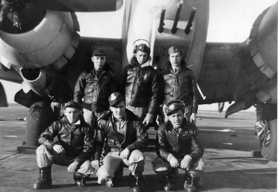 Men in front of a plane