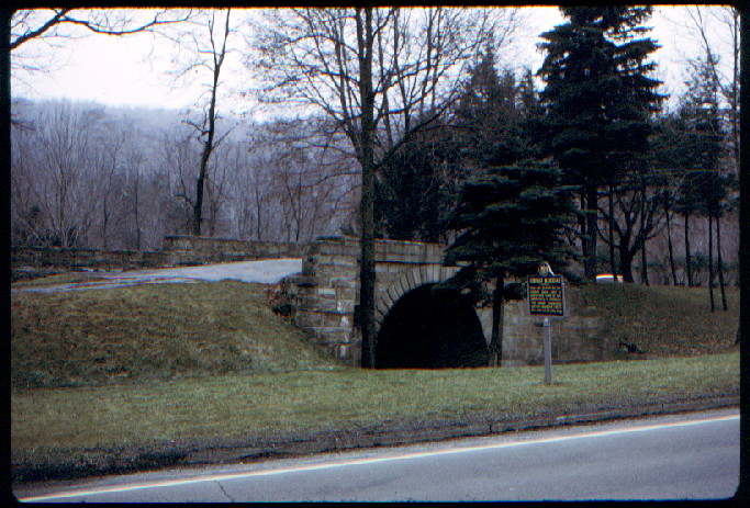 photo of the skew arch bridge tucked in its traffic island between lanes of 'old' 22
