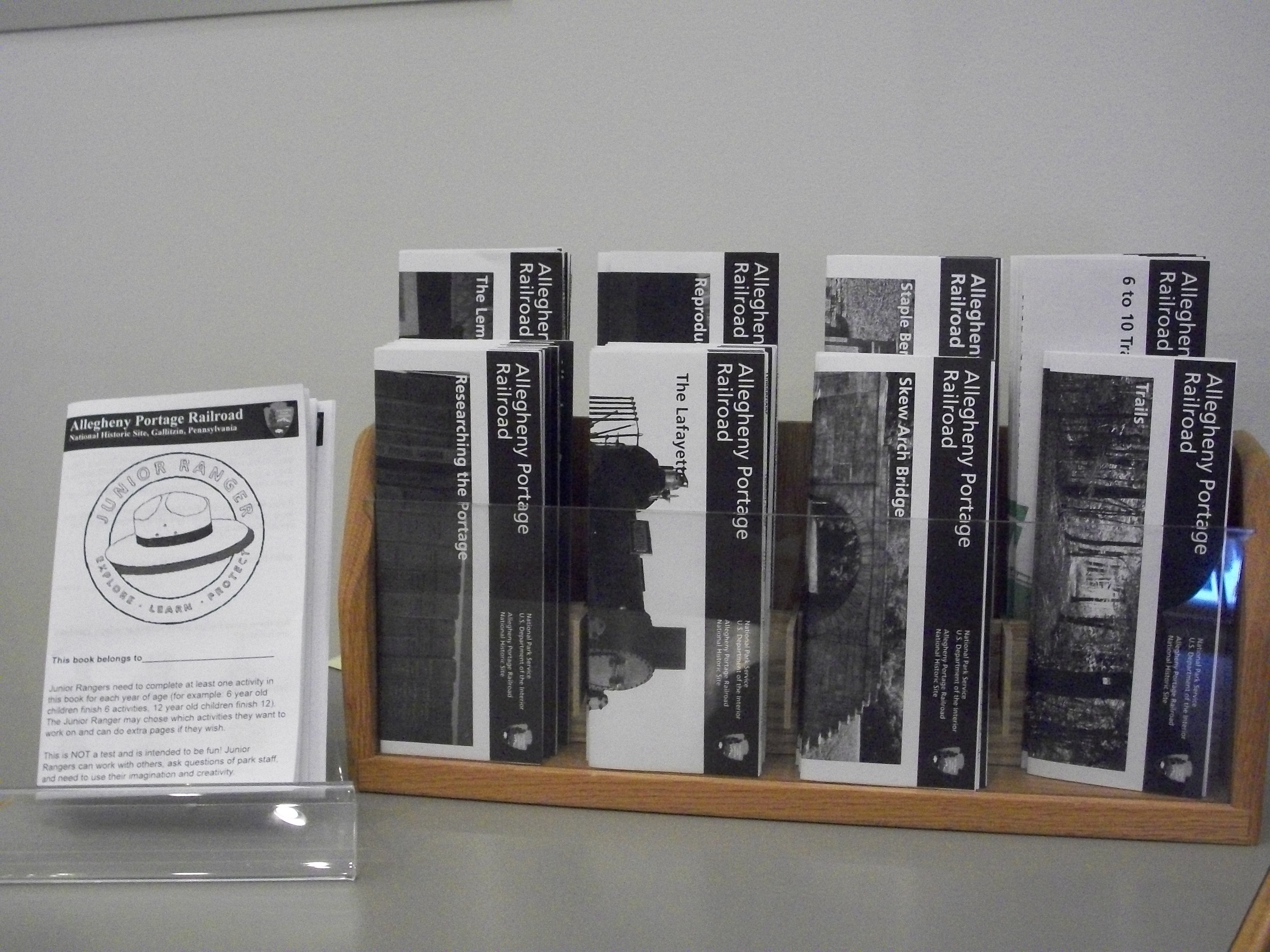 Display of park brochures on the information desk.