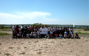 The SCA crew stands with a group of its volunteers. The SCA crew stands with a group of its volunteers.