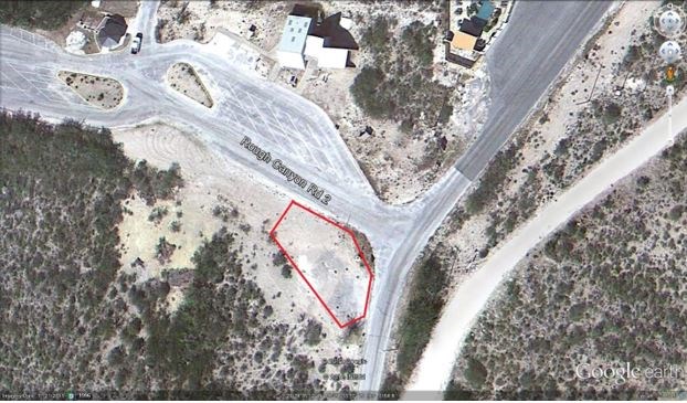 Aerial photo of Rough Canyon parking areas with designated demonstration area outlined in red. It is below the first parking area near the T intersection.