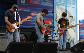 Local musicians The Family Jewels entertain spectators before the final weigh-in for the Battle on the Border at Amistad.