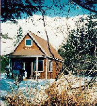 Picture of exterior of cabin during snowy conditions at Kenai Fjords National Park Picture of exterior of cabin during snowy conditions at Kenai Fjords National Park