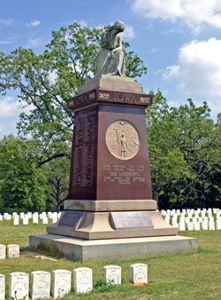 Monument with statue of a mourning woman