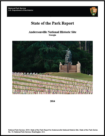 Report Cover with image of monument, flags, and graves