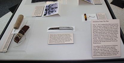 Artifacts and exhibit text inside a protective case