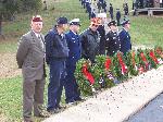 Representatives by service wreaths.