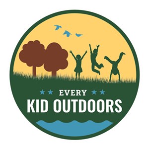 Every Kid Outdoors logo with children playing and doing cartwheels
