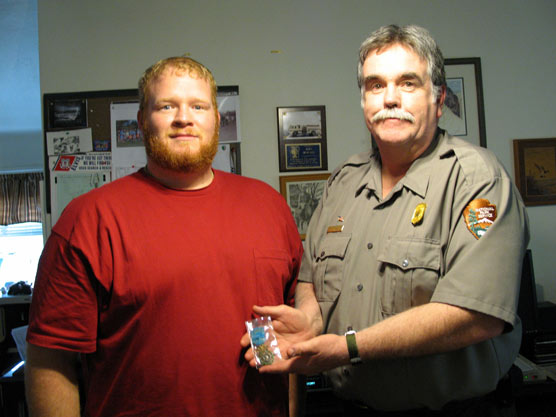 Mr. Corey MacLeod of Greenville, South Carolina donates Congressional Medal of Honor to Antietam Superintendent John Howard