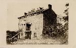 Postcard of the back of the McLean House