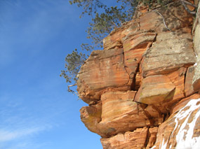 Mainland Caves blue sky red stone
