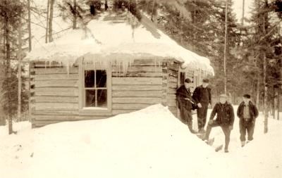 John Nelson greets friends at his cabin