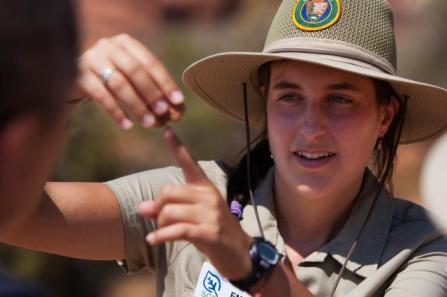 Volunteer explaining rock formations