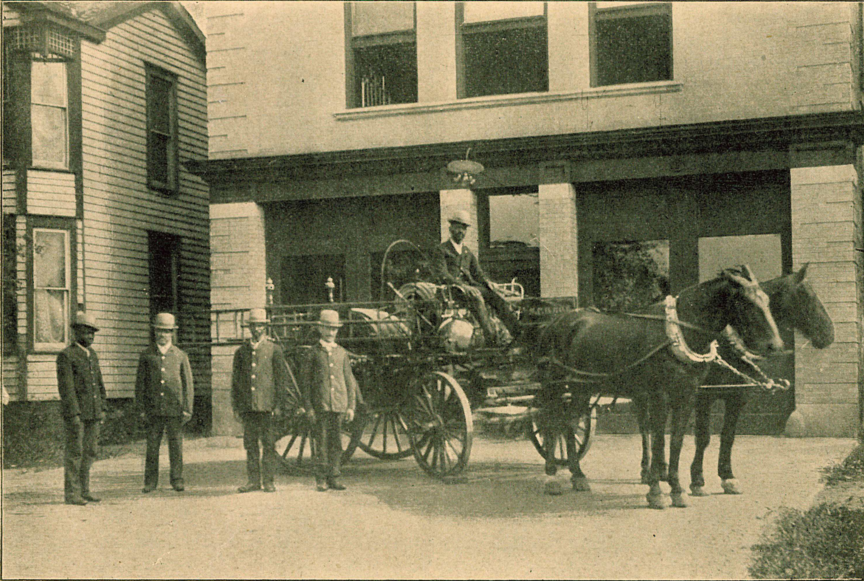 Firehouse No. 5 firefighters with a horse -drawn fire carriage