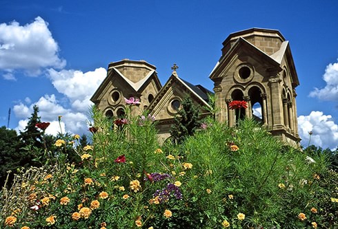 The Territorial-era Basilica Cathedral of St. Francis stands on the site of the city's original adobe parróquia (parish church), east of the historic plaza. Photo © Jack Parsons